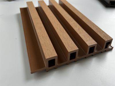 How co extrusion improves surface hardness on WPC panels?