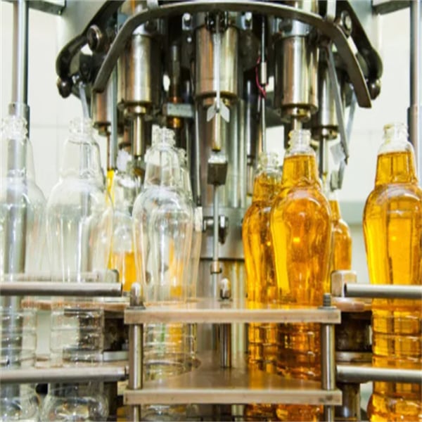 Increase Efficiency with an Automated Oil Bottle Filler