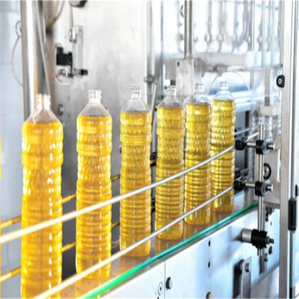 The process of oil filling in industrial equipment for optimal operation.