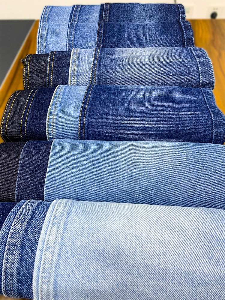Custom wholesale factory direct sales ladies new casual fashion pocket design decoration medium blue wash micro flared jeans manufacture