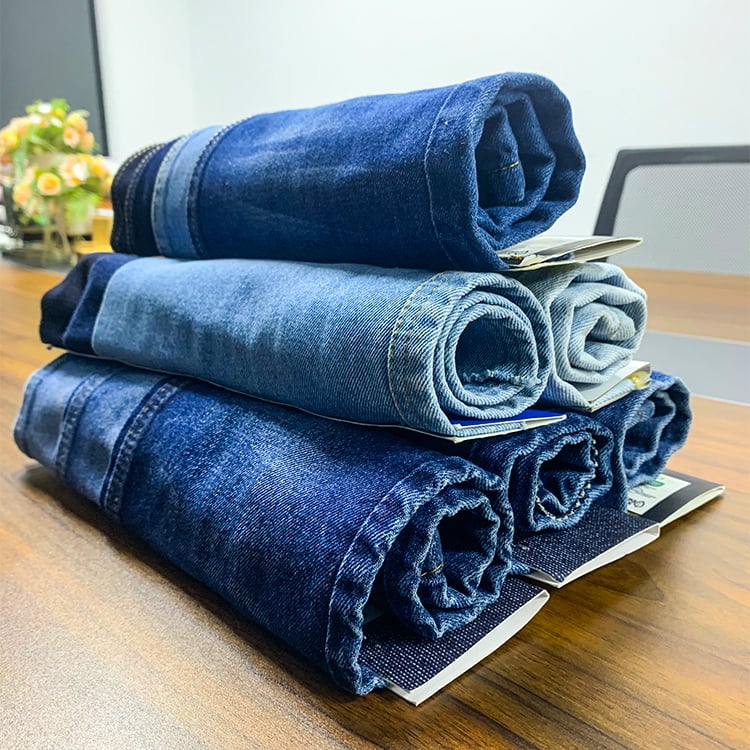 Custom wholesale factory direct sales ladies new casual fashion pocket design decoration medium blue wash micro flared jeans details