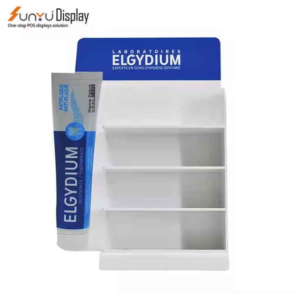 Versatile display stand suitable for toothpaste tubes of all sizes and shapes.