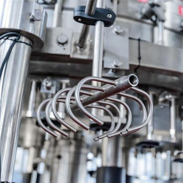 Controllo della qualità - Macchina per il riempimento automatico di bottiglie