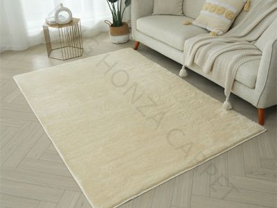 Il ruolo dei tappeti in pelliccia sintetica di coniglio nel migliorare il comfort della camera da letto