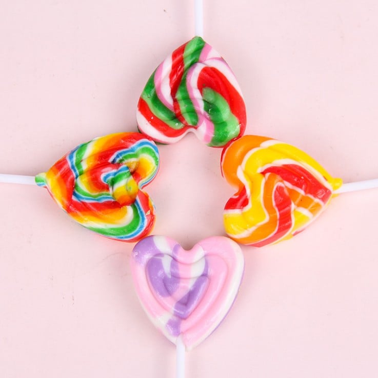 Custom halal fruit flavor heart shape rainbow hard lollipop candy supplier