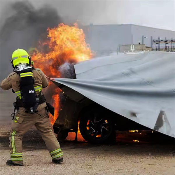The benefits of having a fire blanket on hand for electric car emergencies.