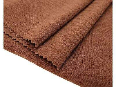 Air-Textured Yarns in Lightweight Crepe Fabric Engineering
