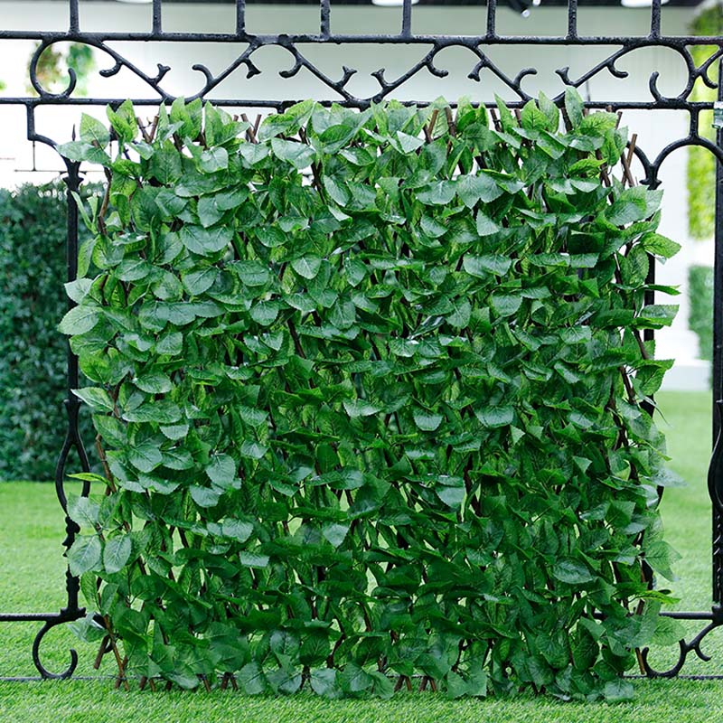 Conas a fheabhsaíonn liathróga topiary bláthanna artaifisiúla do thaispeántas aistriúcháin?