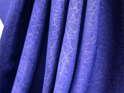 Comment le tricot jersey extensible améliore le confort et l'ajustement