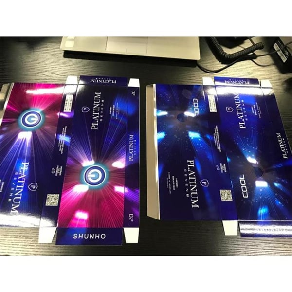 Vliv grafických varovných nálepěk na obalech cigaretových krabiček.