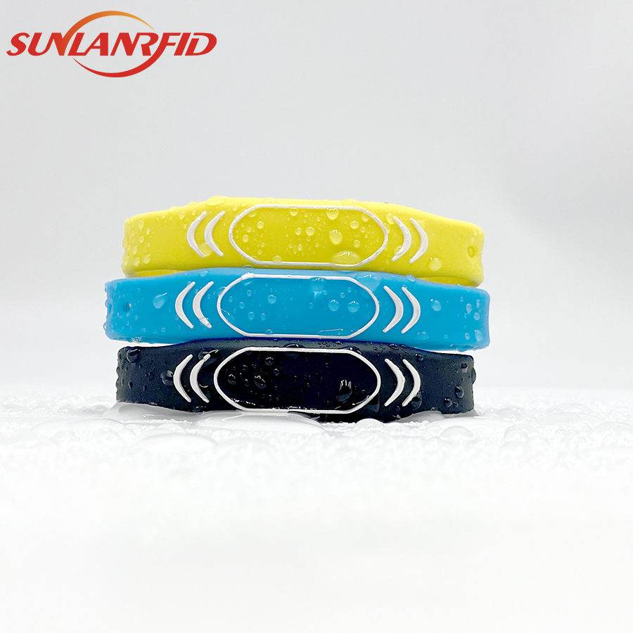 Custom Event Festival Waterproof Adjustable13.56mhz NFC Smart Silicone RFID Wristband Bracelet Door Access Control manufacture