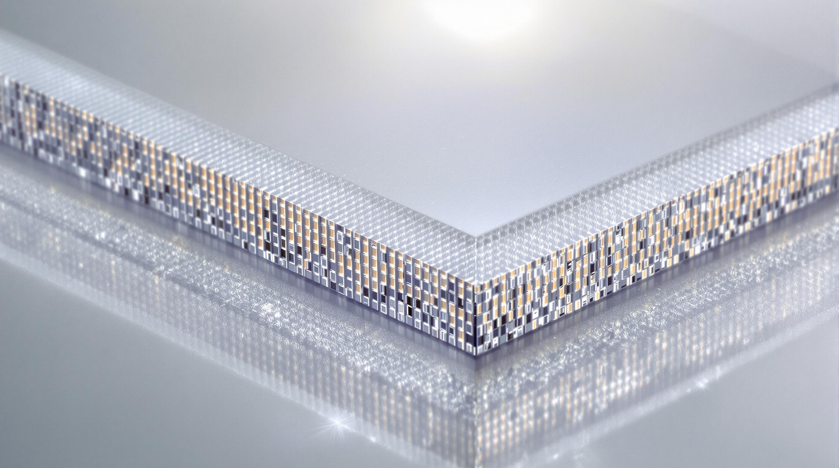 Close-up view of a transparent LED display panel revealing micro-pixel arrays and nanomaterial layers with light shining through