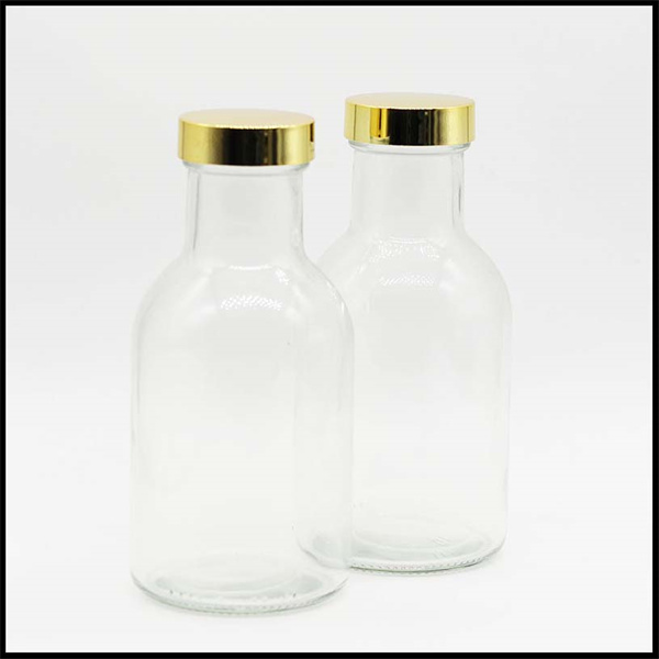 Durable and Reusable Glass Drinking Bottles with Lids
