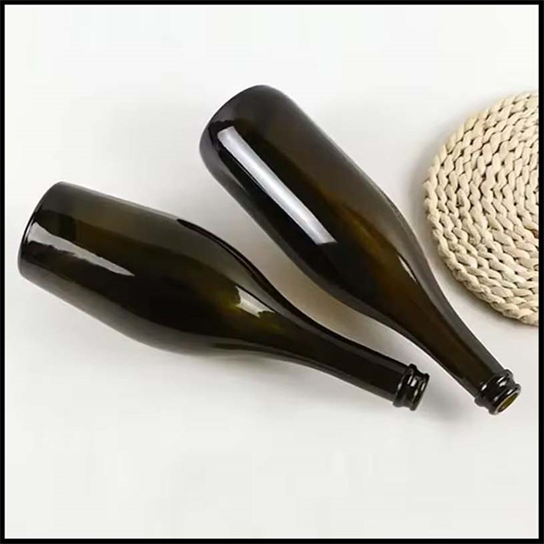 Waste or beauty? The art of repurposing empty champagne bottles.