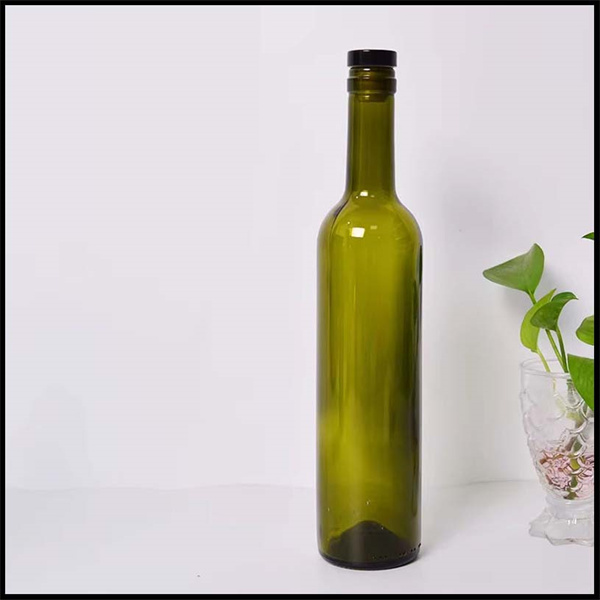 Examining an Empty Wine Bottle