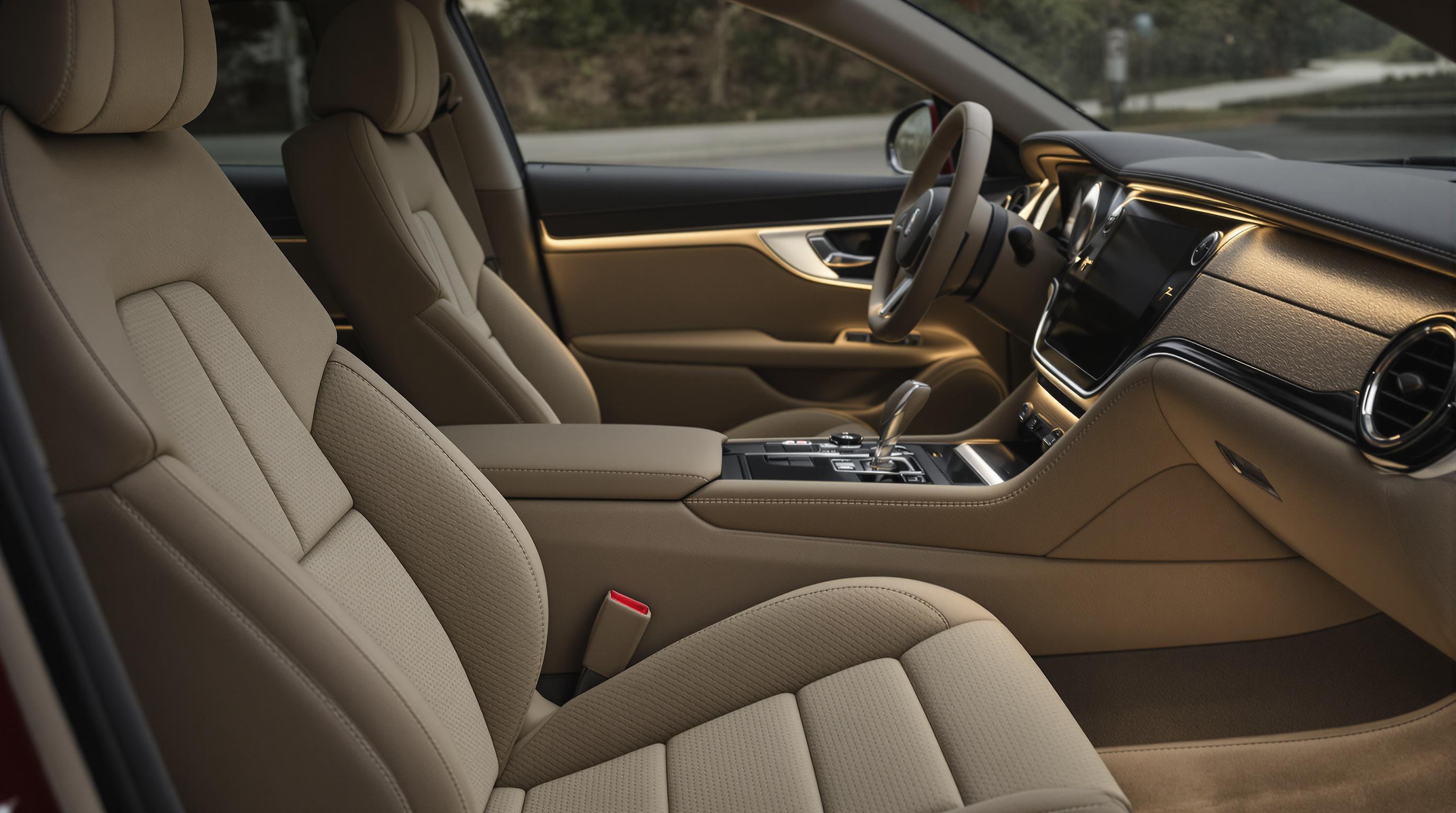 Eco-friendly luxury car interior featuring suede-like recycled fabric seats and dashboard panels