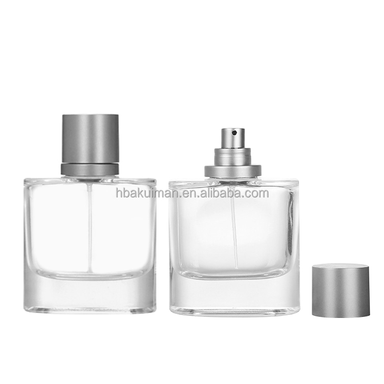 Wholesale Luxury Oval Flat Glass Spray Bottle 60ml 100ml Refillable Men Cologne Perfume Bottle with Crimp Neck supplier