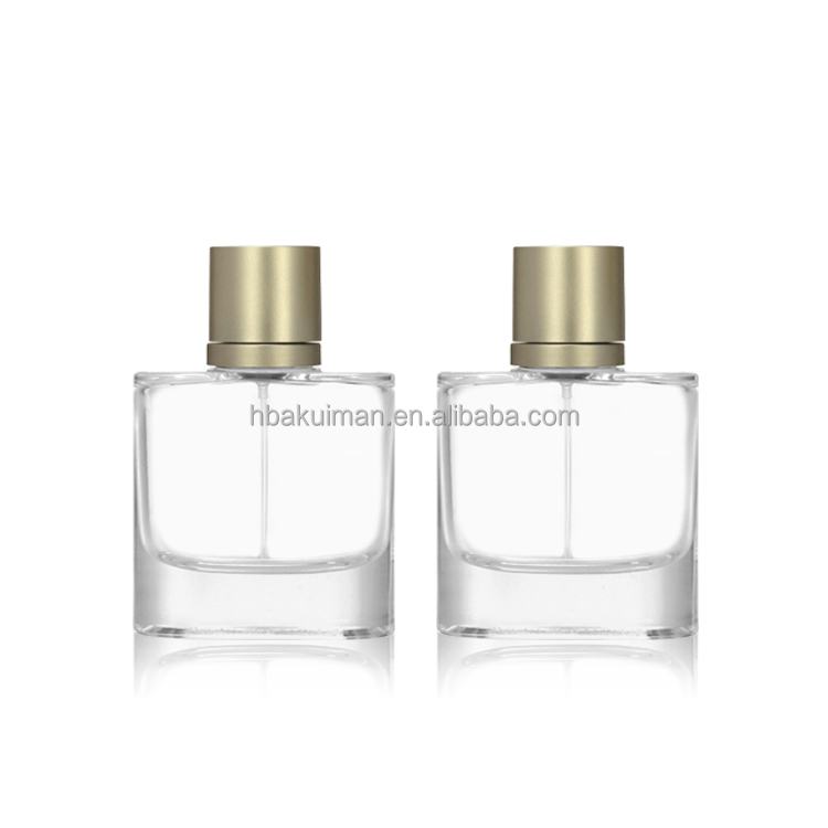 Wholesale Luxury Oval Flat Glass Spray Bottle 60ml 100ml Refillable Men Cologne Perfume Bottle with Crimp Neck supplier