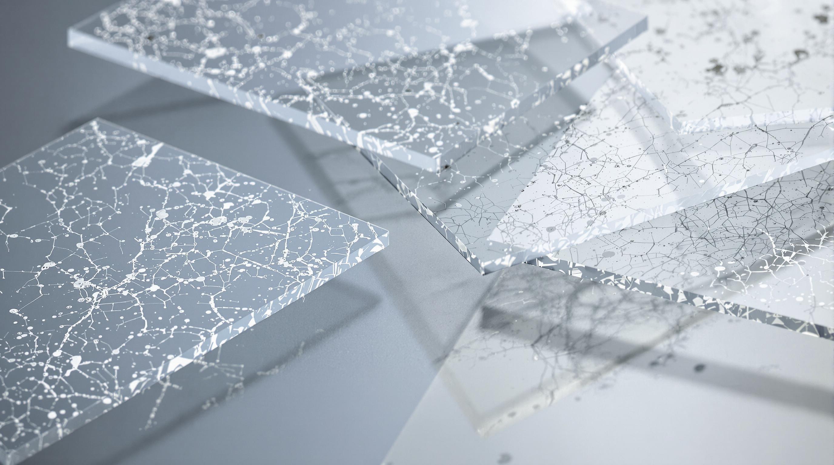 Macro photo of acrylic resin films with metal particles and branching textures