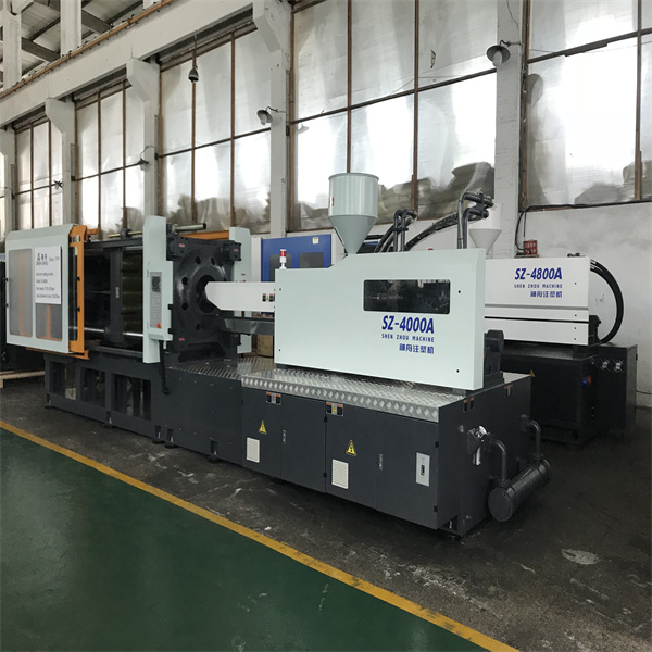 Experience seamless cap production with a top-of-the-line moulding machine