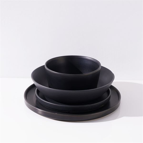 These black plates and bowls are not only beautiful, but also built to last.