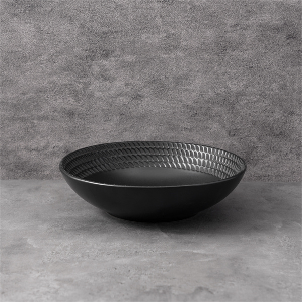 A timeless classic, the black ceramic plate is a staple for any kitchen.