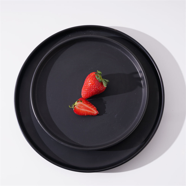 Timeless style meets durability in this black ceramic dinnerware set