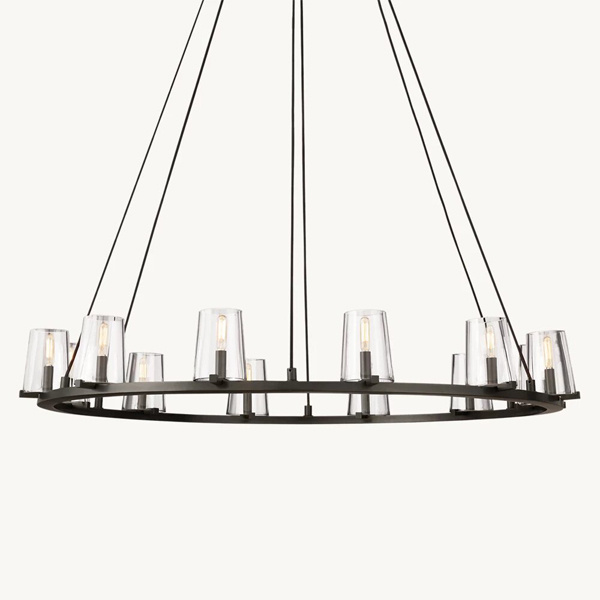 Crea un punto focale con un elegante lampadario per la sala anteriore