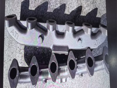 Where is the exhaust manifold located