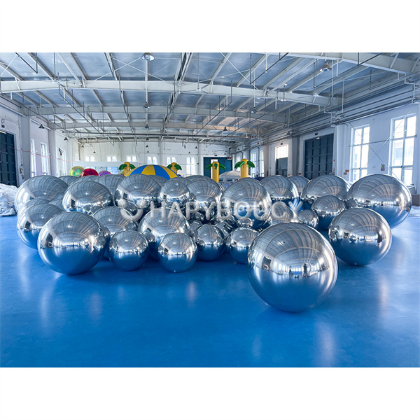 The unique experience of watching inflatable mirror balloons float gracefully overhead.
