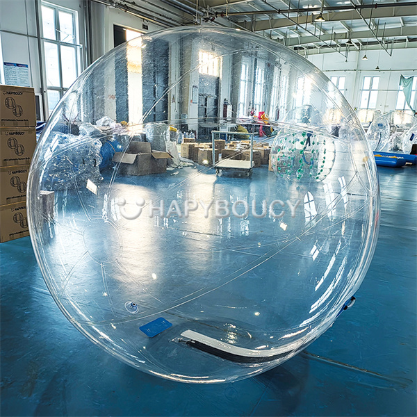 Step inside a giant water bubble and walk on water in a human hamster ball.