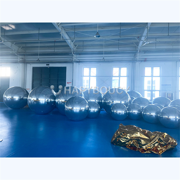 The dazzling effects of inflatable mirror balloons in outdoor settings.