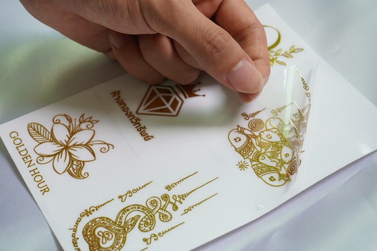 Custom Printing Logo Label Luminous Golden Sticker Vinyl Adhesive Waterproof Stickers Custom Fluorescent Sticker supplier