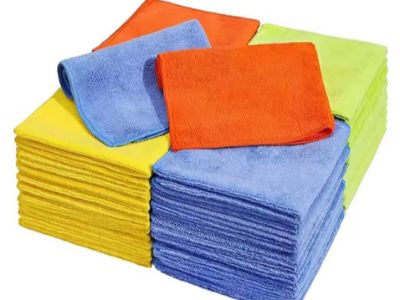 Why do commercial cleaning staff prefer microfiber mop cloths in high-traffic areas?