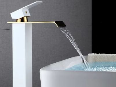 The Calming Sound of a Waterfall Bathtub Faucet in High-End Baths