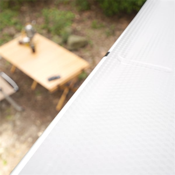 Creating a cozy campsite with a truck camping awning