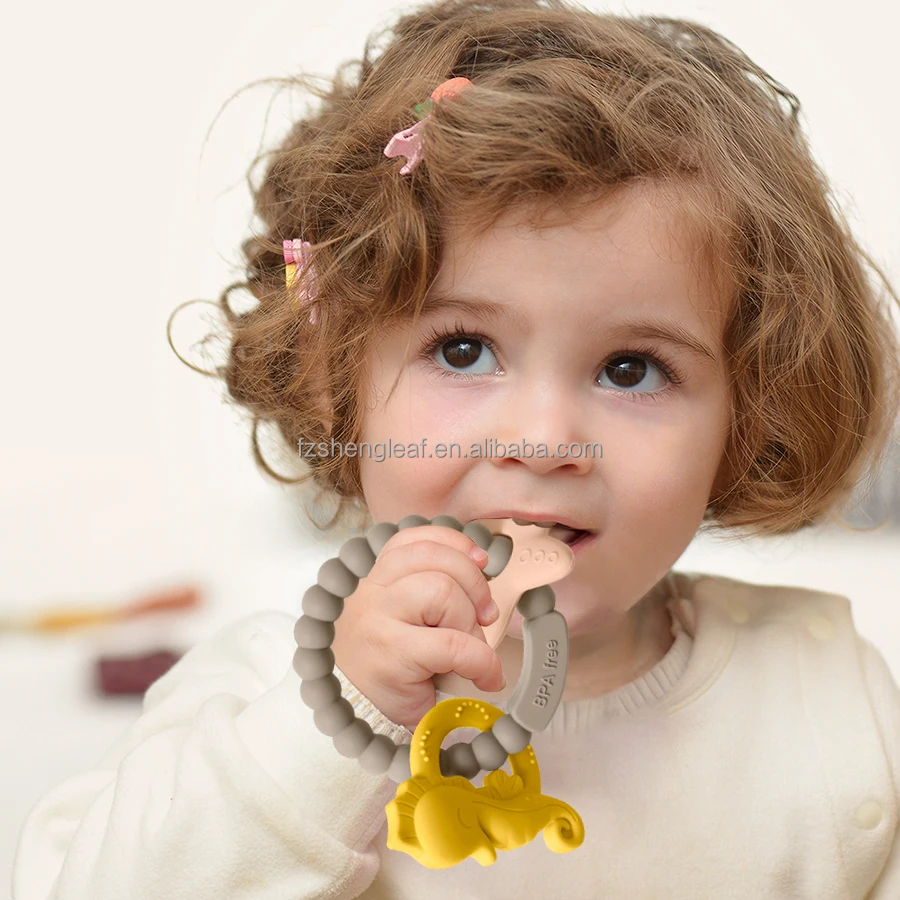 Round Beads Food Grade BPA-Free Custom Silicone Baby Teether Soft Chewable Toy Pacifier Ring Unisex Ages 0-24M supplier