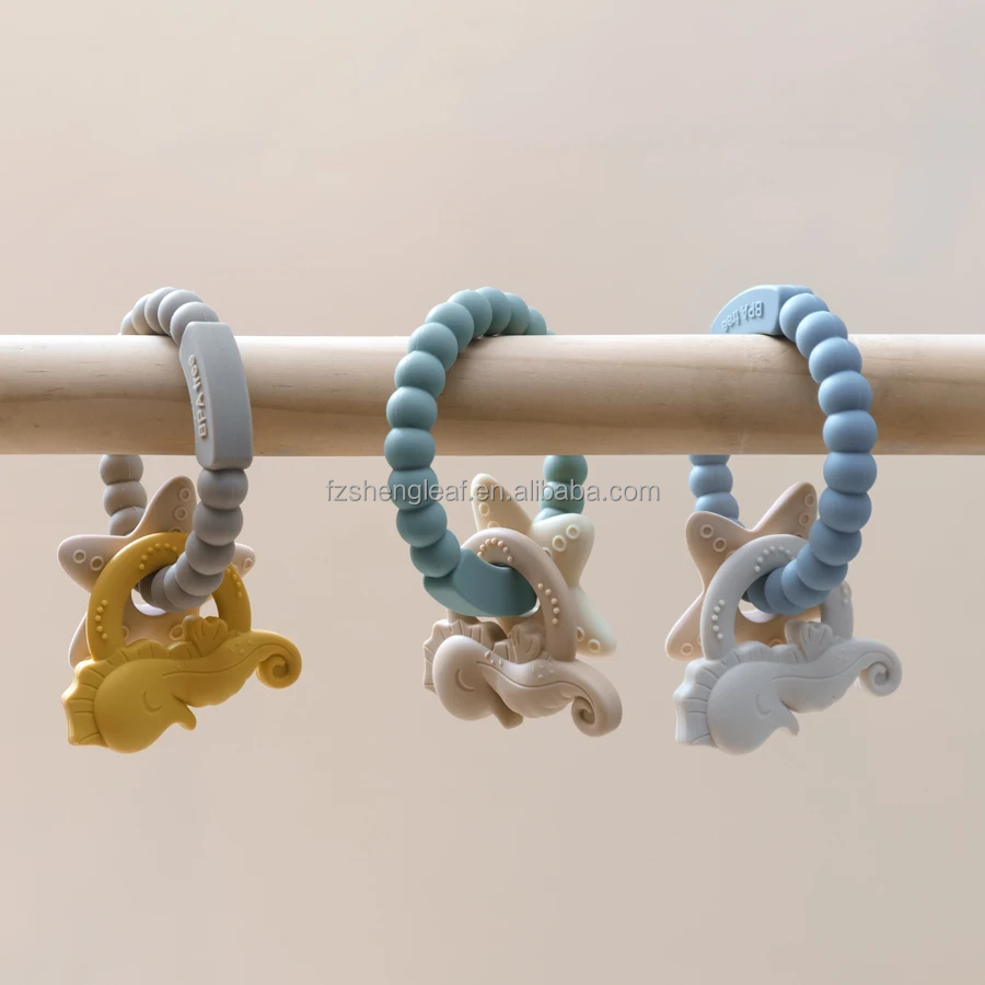 Round Beads Food Grade BPA-Free Custom Silicone Baby Teether Soft Chewable Toy Pacifier Ring Unisex Ages 0-24M supplier