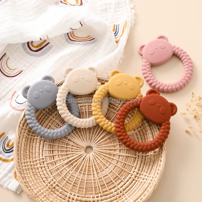 Unisex Newborn Pacifier Ring Food-Grade Silicone Teether BPA Free Rattles Bracelet Soft Cartoon Teething Toys Baby Teethers manufacture