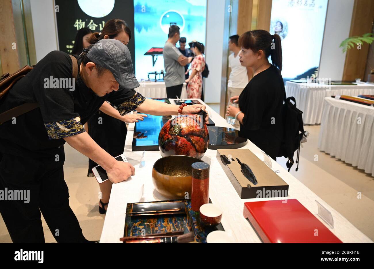 fuzhou-chinas-fujian-province-15th-aug-2020-people-visit-an-exhibition-of-lacquerware-in-fuzhou-capital-of-southeast-chinas-fujian-province-aug-15-2020-credit-lin-shanchuanxinhuaalamy-live-news-2CBRH1B.jpg