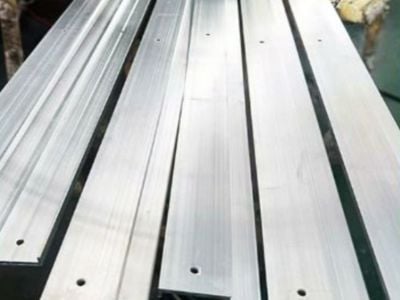What are the common alloys used for custom aluminum enclosures