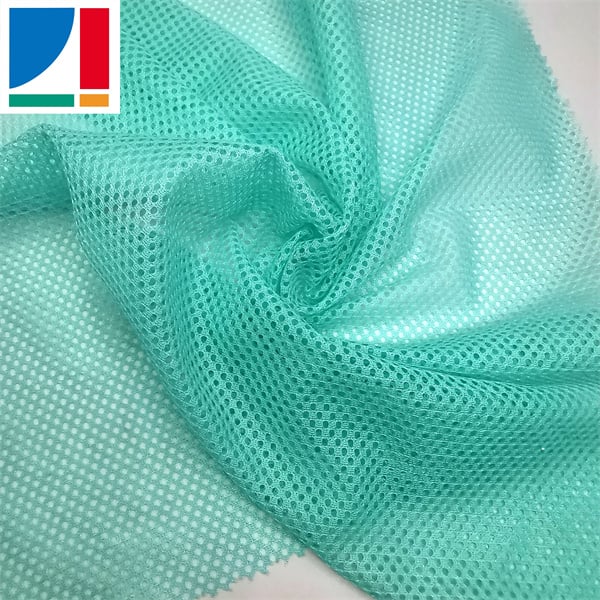 The versatility of mesh fabric in fashion and activewear"