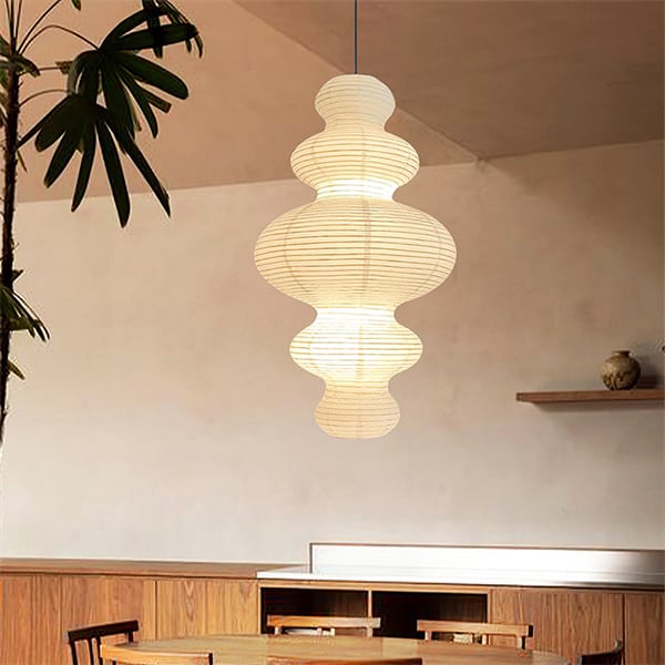 Create a serene atmosphere with the soft lighting of a rice lamp.