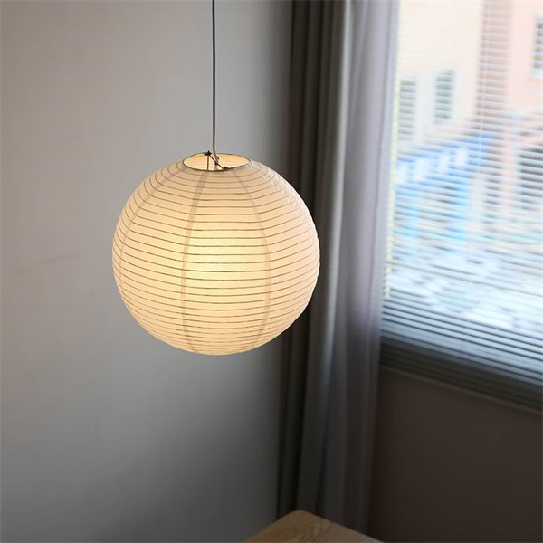 Embrace simplicity with a minimalist rice paper lamp design.