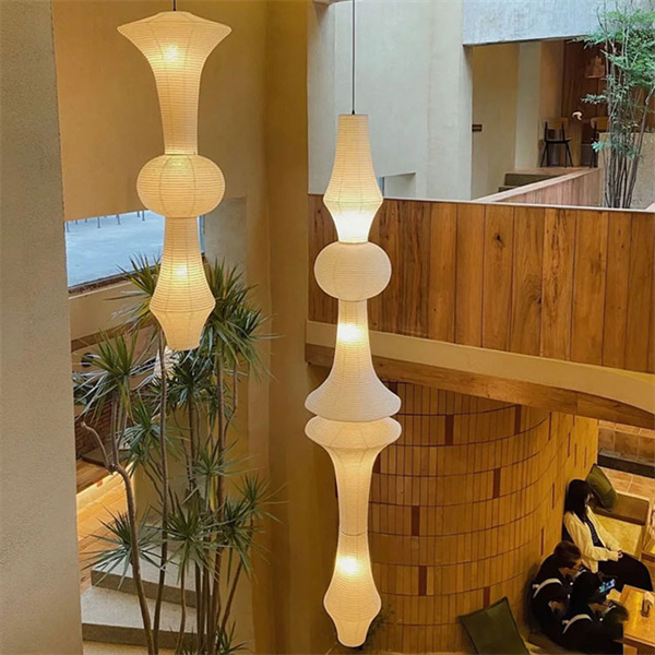 Create a serene and peaceful ambience with the gentle light of a Japanese paper lamp