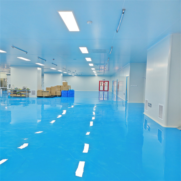 The critical importance of protective gear in semiconductor clean rooms.