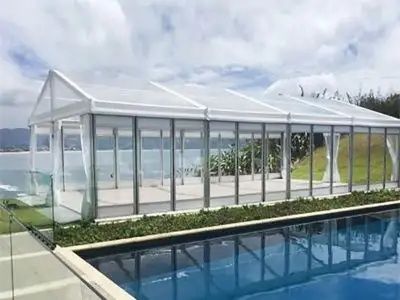 How Glass Tents Transform Simple Lawns into High-End Ballrooms