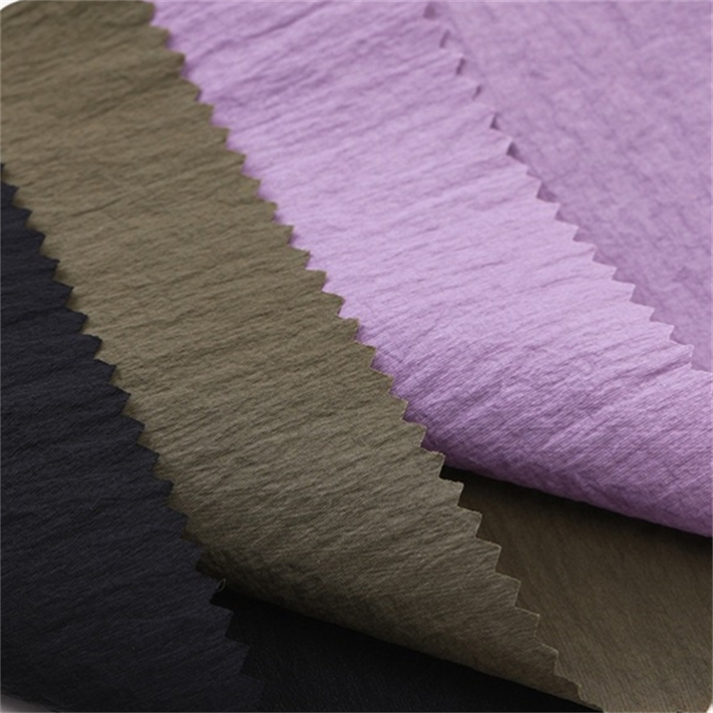 Waterproof 100% Nylon 40D 310T Nylon Taffeta Wrinkle Fabric for down jacket supplier