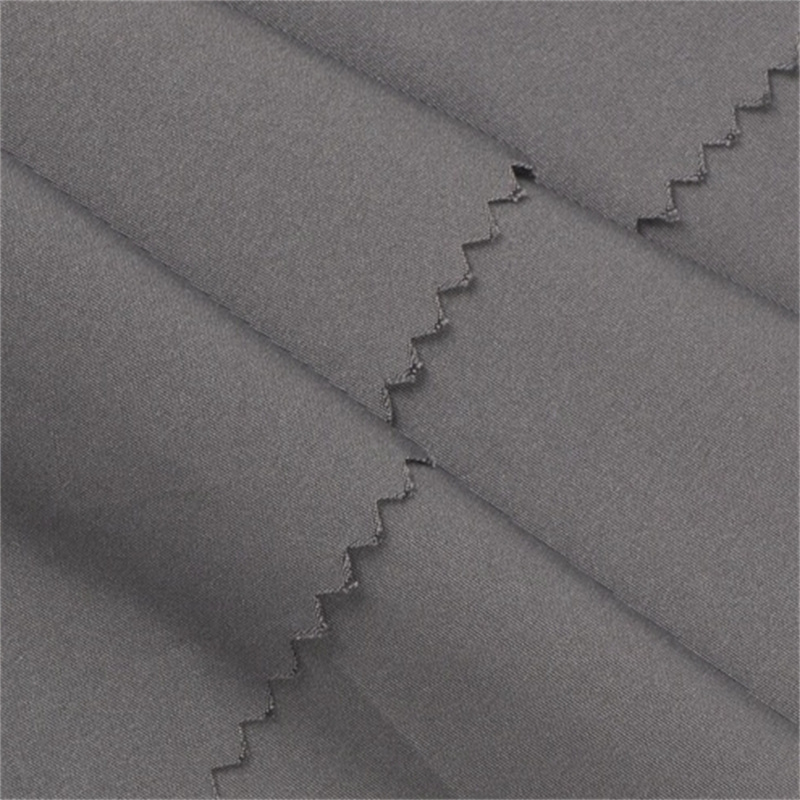 High quality 100%polyester 50D plain memory Fabric for jacket coat supplier