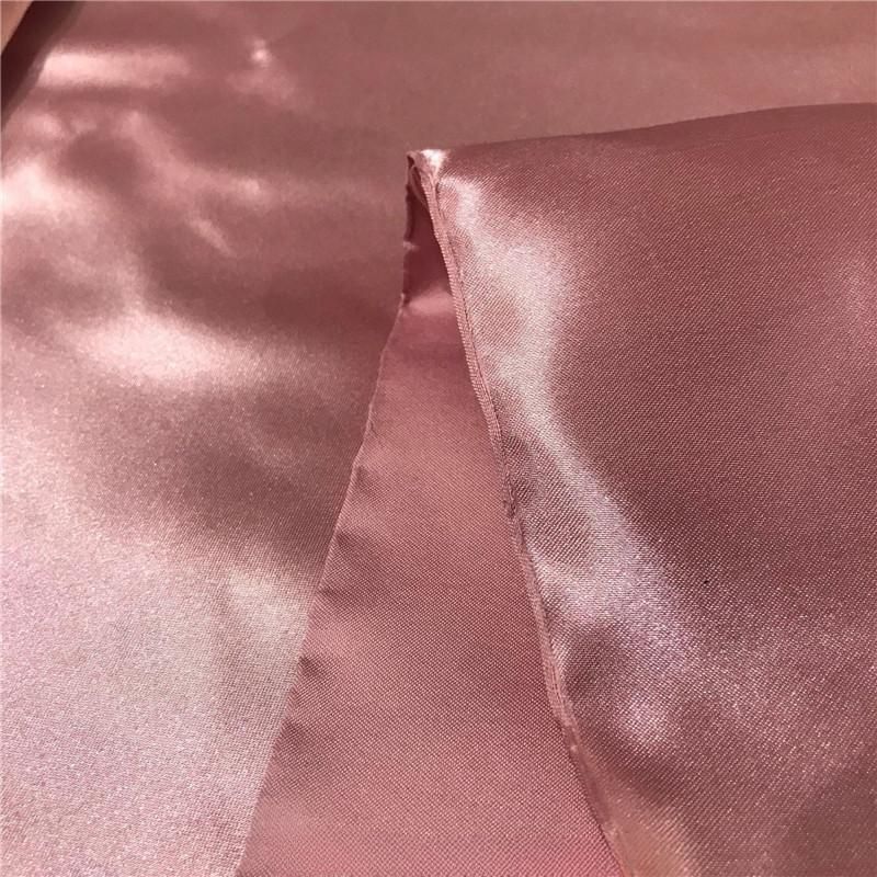 Tissu en satin de duchesse 100% polyester 75D*150D fabriqué directement par le fabricant, avec un toucher confortable